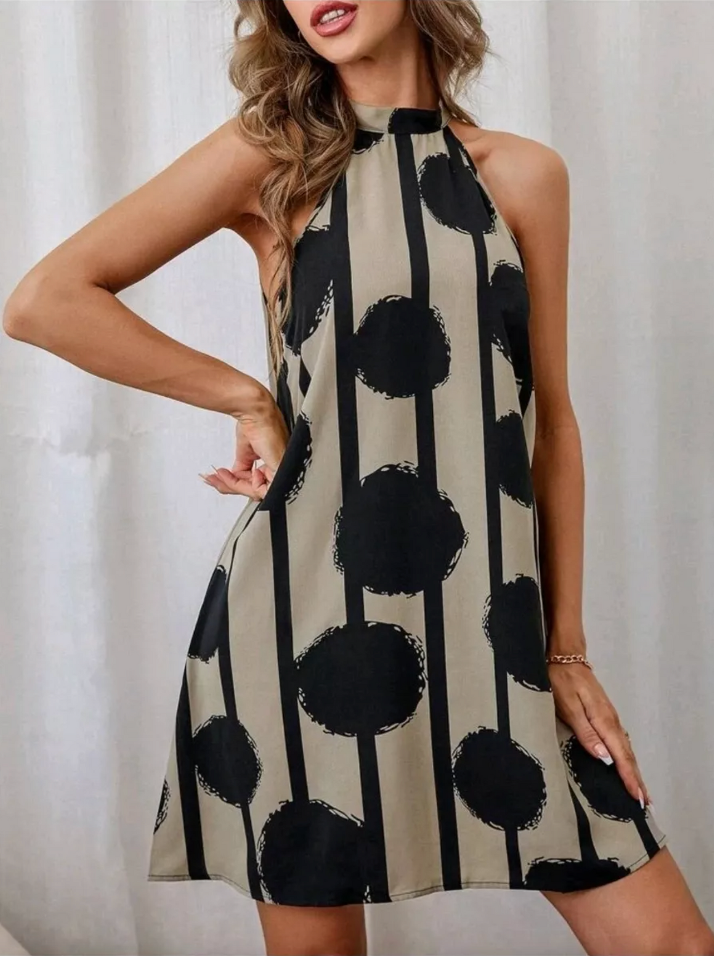 Vestido de rayas con estampado de lunares