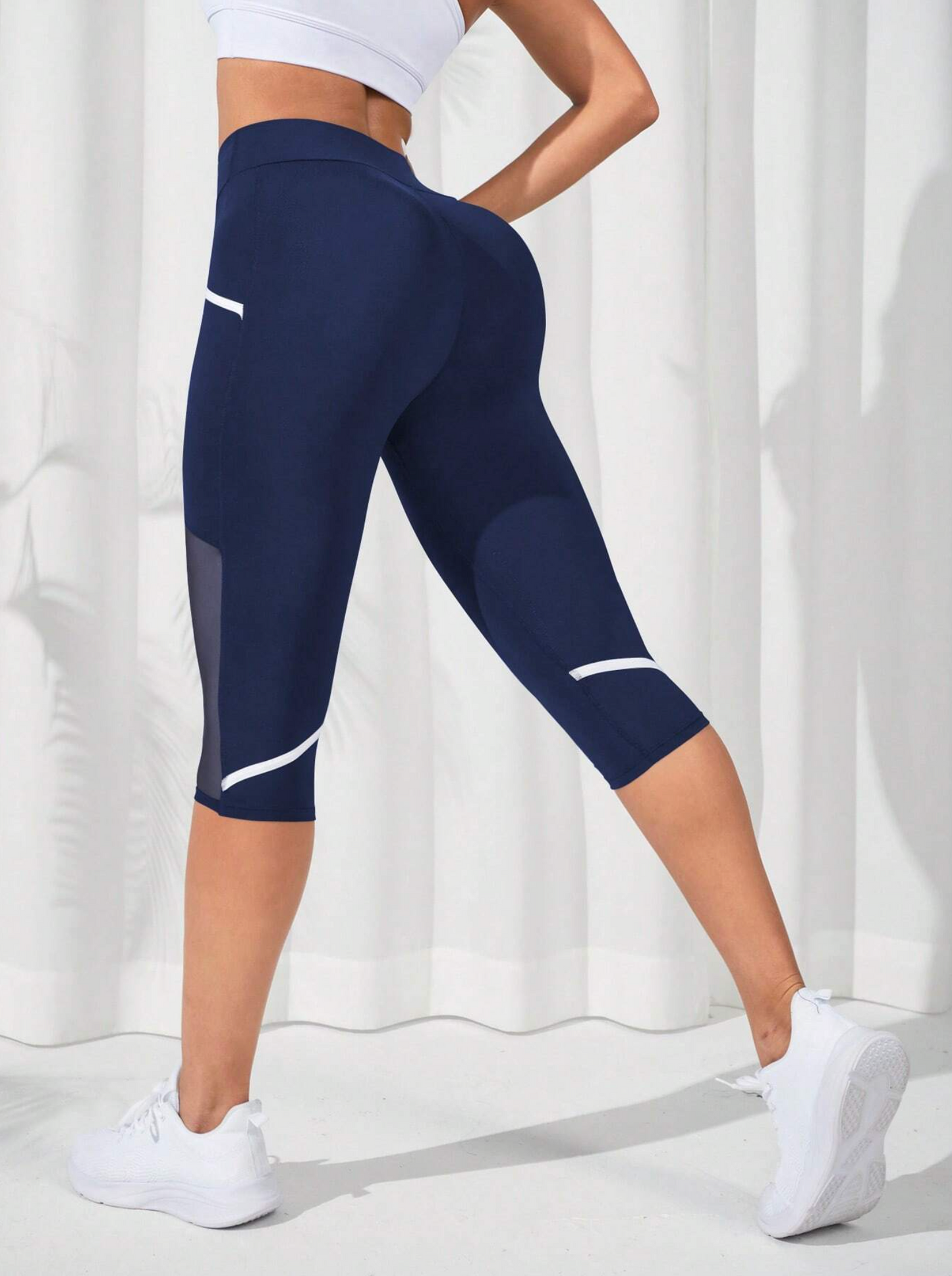 Leggings Deportivos Capri con Detalles de Malla en Contraste